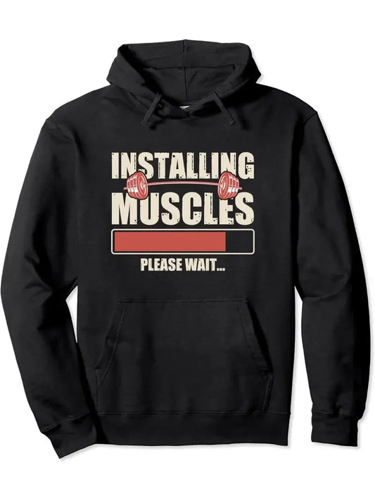 Men's black hoodie with 'Installing Muscles' graphic and bar loading design, perfect for casual streetwear.