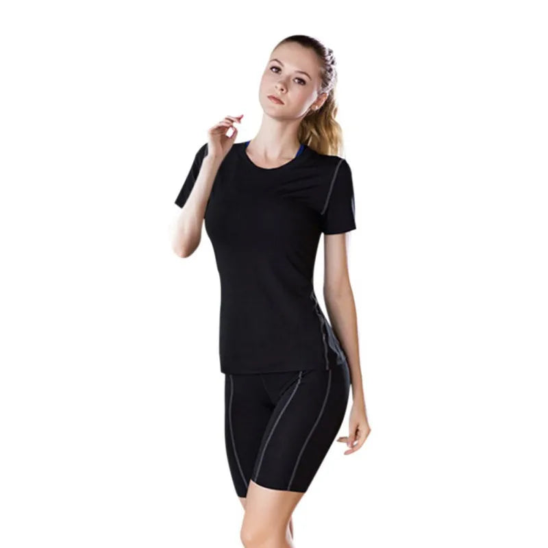 Fitness women's quick drying T-shirt in black, designed for high performance and all-day comfort during workouts.