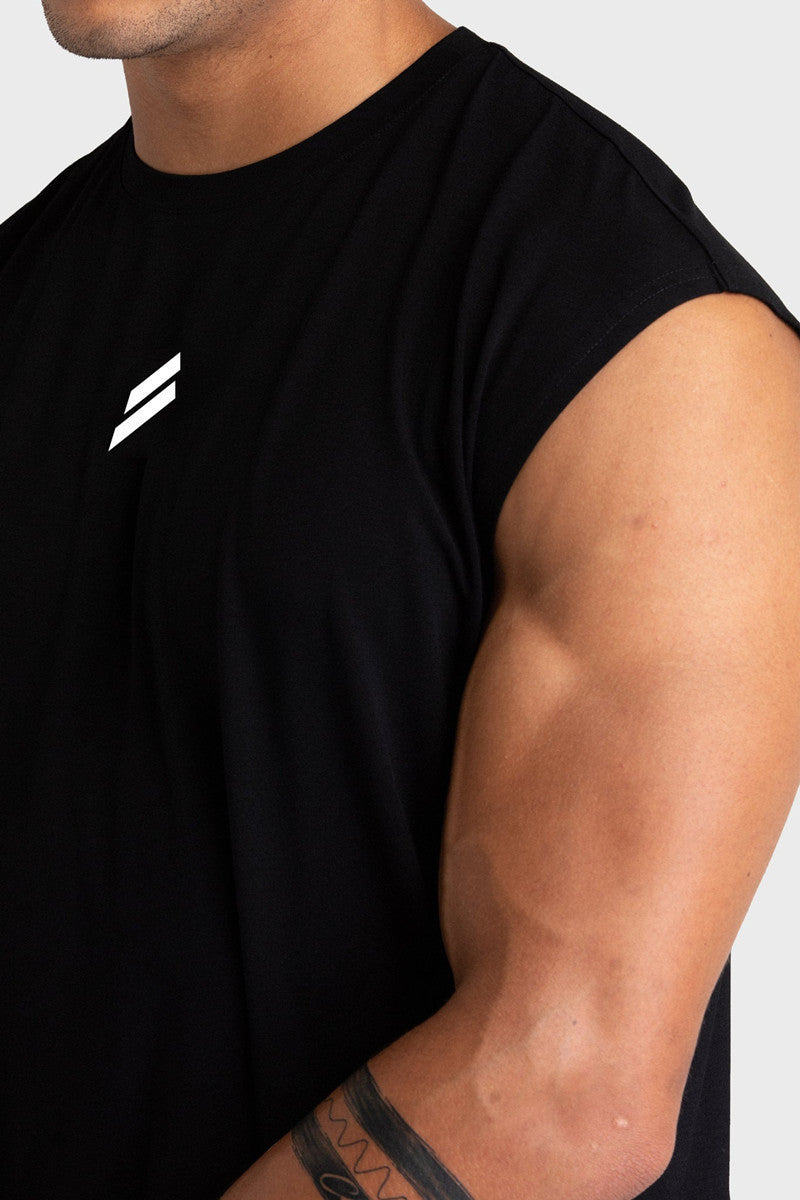 Man wearing a black sleeveless sports tank top, showcasing muscular arm and logo detail.