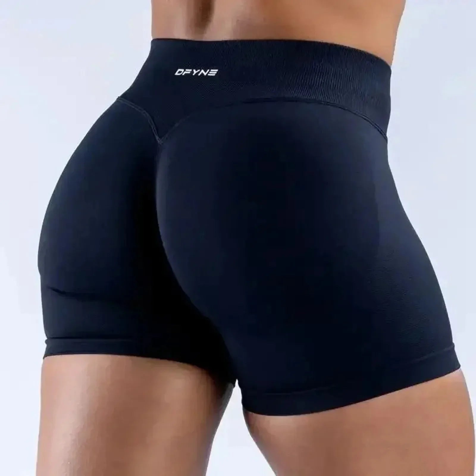 Women's gym sports tight running shorts in black, showcasing the fit and flexibility for workouts and active lifestyle.