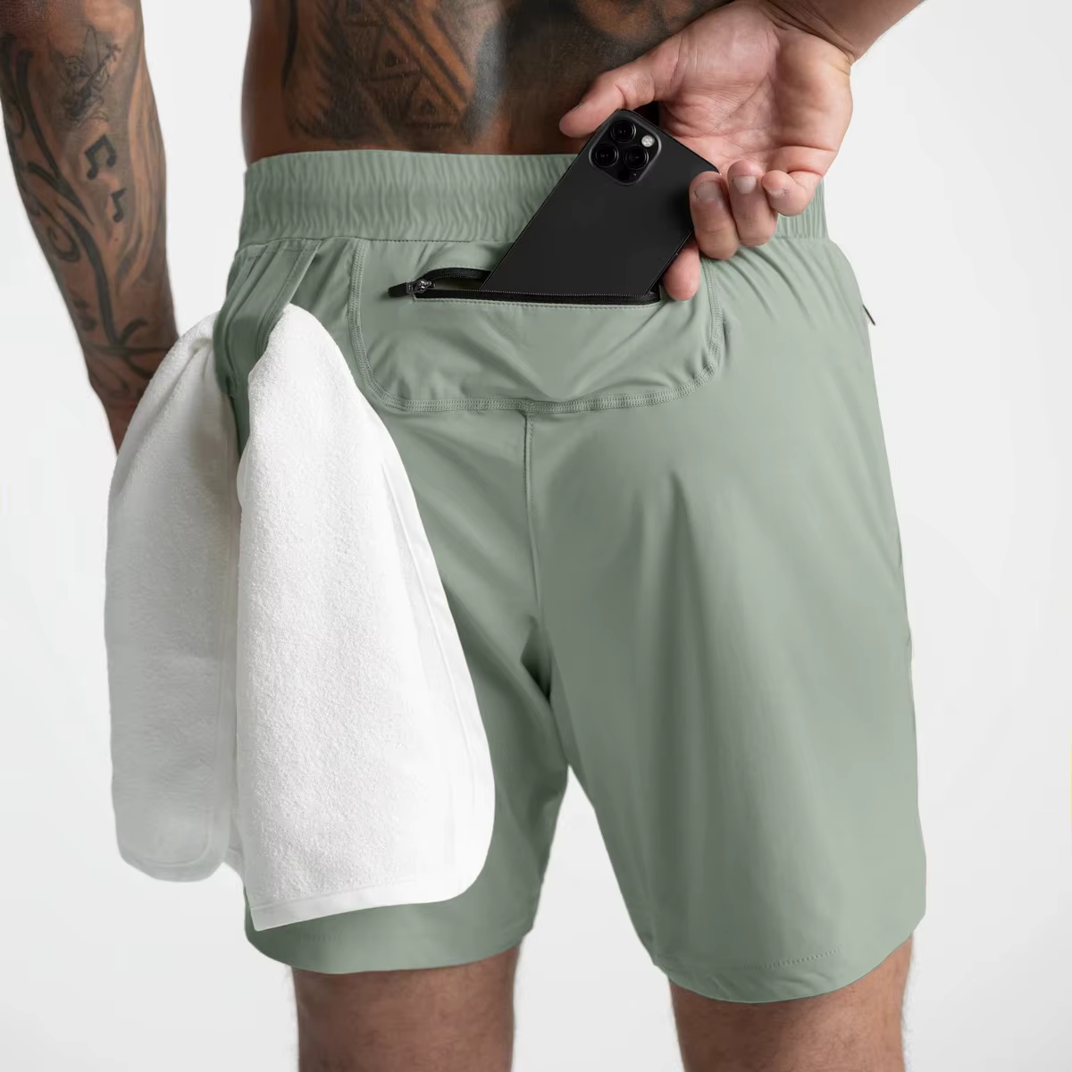 Men's lightweight single-layer gym shorts with a towel and phone pocket, perfect for athletes.