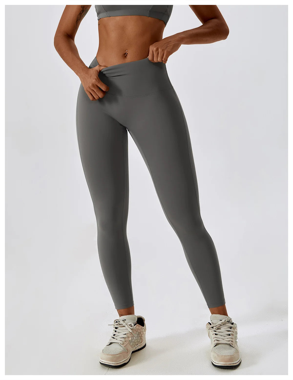 High-waist scrunch butt yoga leggings in gray for women, designed for comfort and style during workouts.