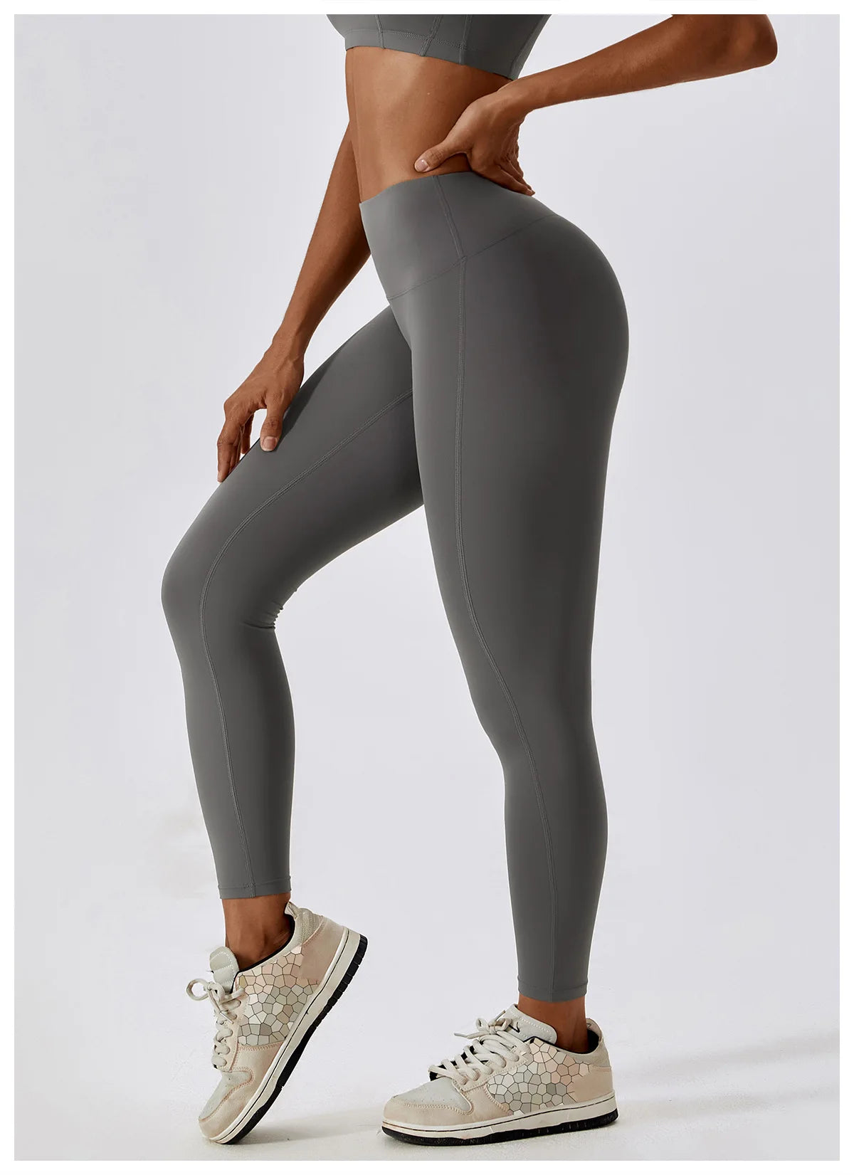 High-waist scrunch butt yoga leggings for women in grey, designed for comfort and style during workouts.