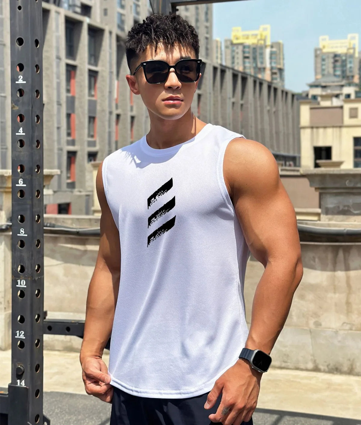 Men's quick-dry sleeveless gym tank top in white, perfect for summer workouts and designed for comfort and mobility.