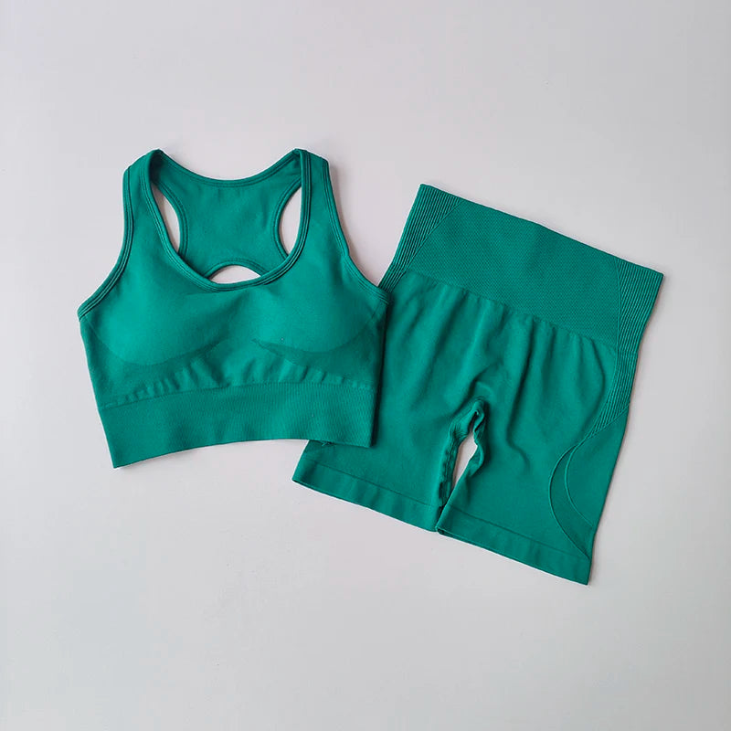 2-piece seamless teal yoga set featuring a sports bra and high-waisted shorts, ideal for workouts and activewear.