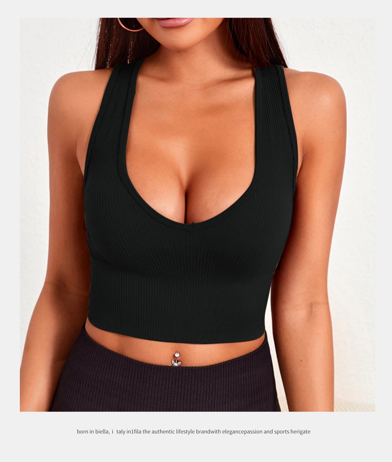 Seamless ribbed yoga vest in black, designed for women, featuring a deep neckline and no padding for comfort and movement.