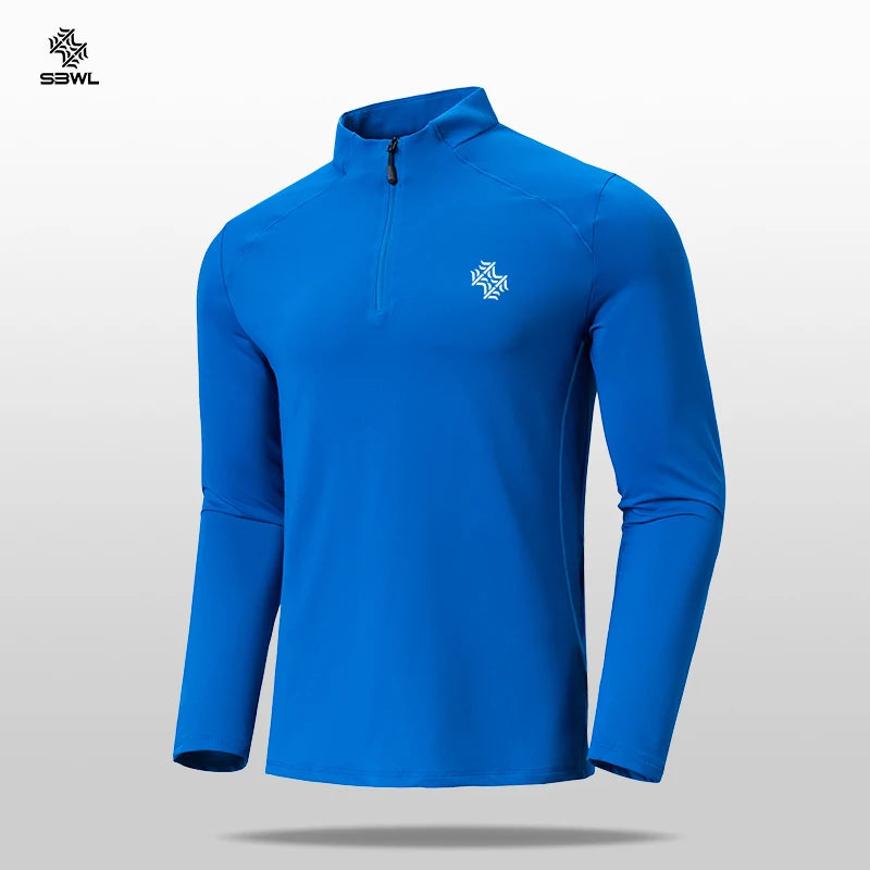 Men's blue long sleeve fitness top with a quarter zipper, perfect for workouts and outdoor activities.