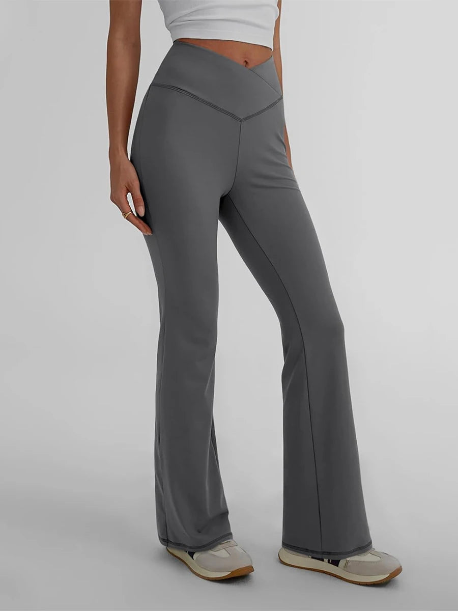 Women's high waist yoga leggings in gray, designed for comfort and performance during workouts.
