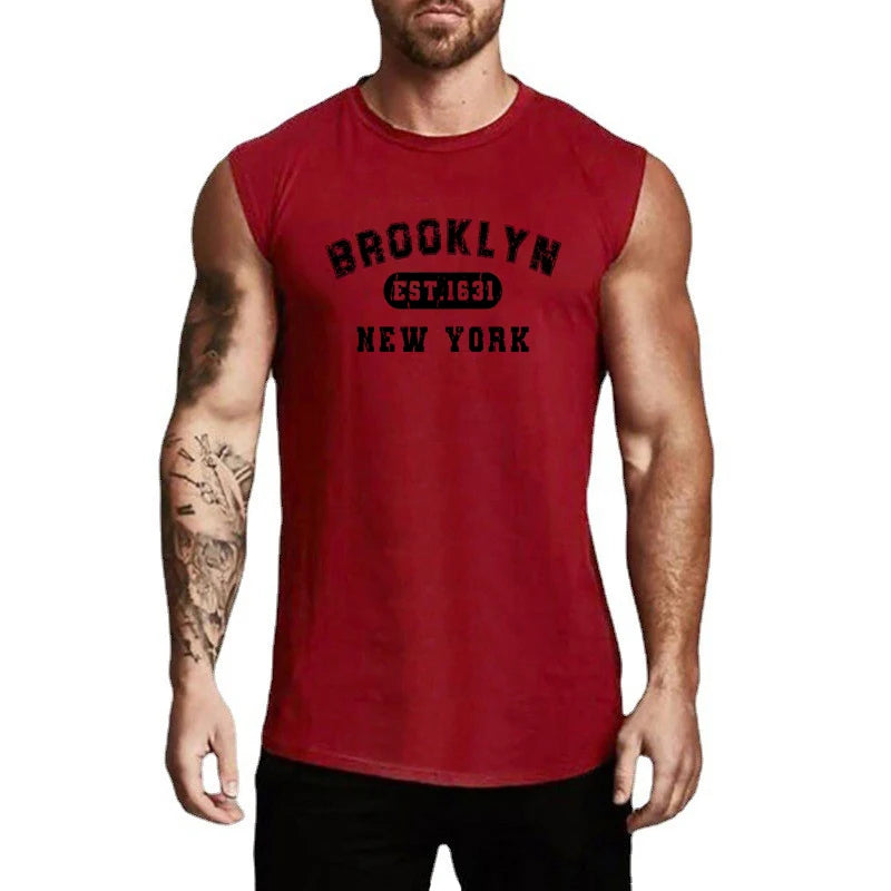 Red sleeveless bodybuilding tank top featuring 'Brooklyn EST. 1631' graphic design for a relaxed workout look.