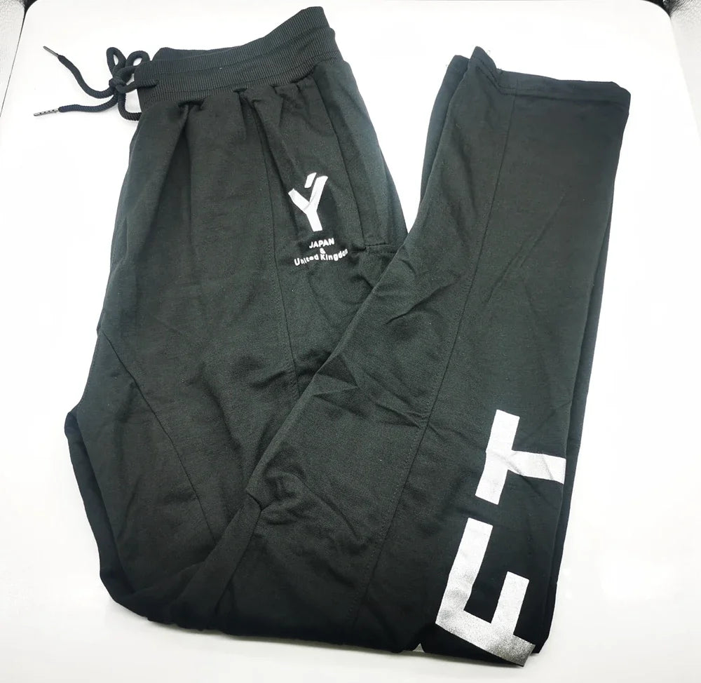 Men's performance training pants in black, featuring comfortable stretch and moisture-wicking technology.