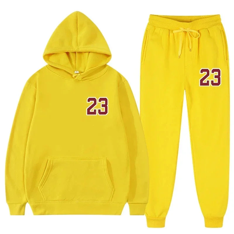 Yellow hoodie and sweatpants sports set featuring a number 23, ideal for workouts and casual wear.