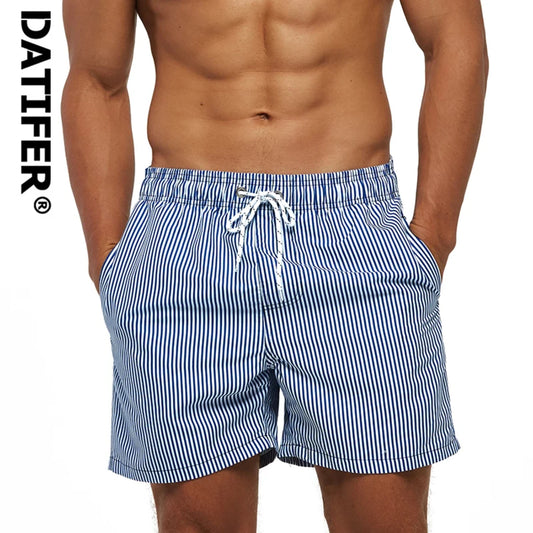Men's striped beach shorts with elastic waistband, ideal for summer and swimming activities.