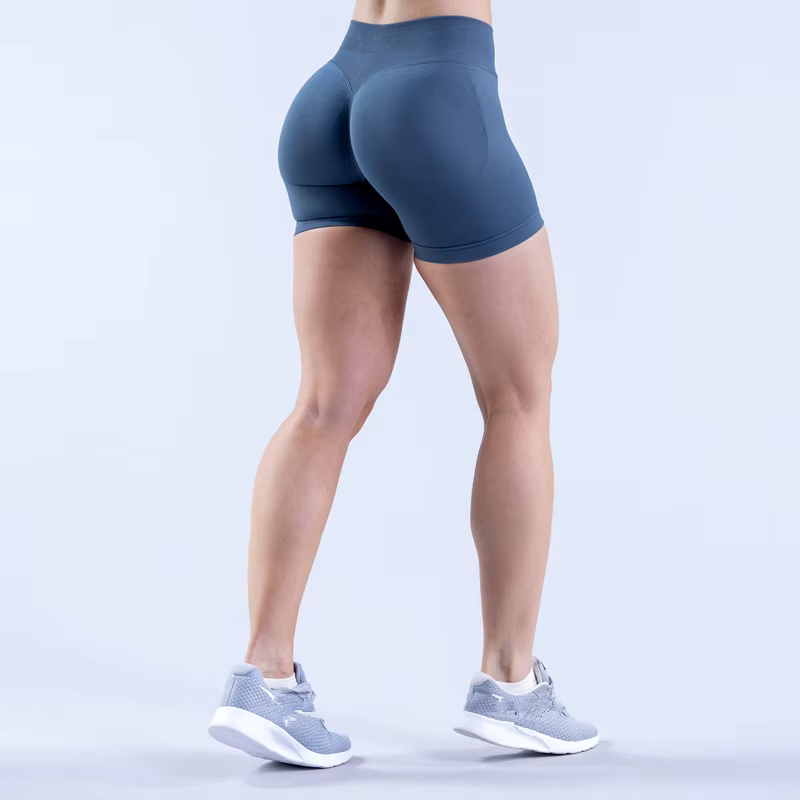 Woman wearing Gym Impact Running Shorts from the back, showcasing versatile athletic wear for workouts.