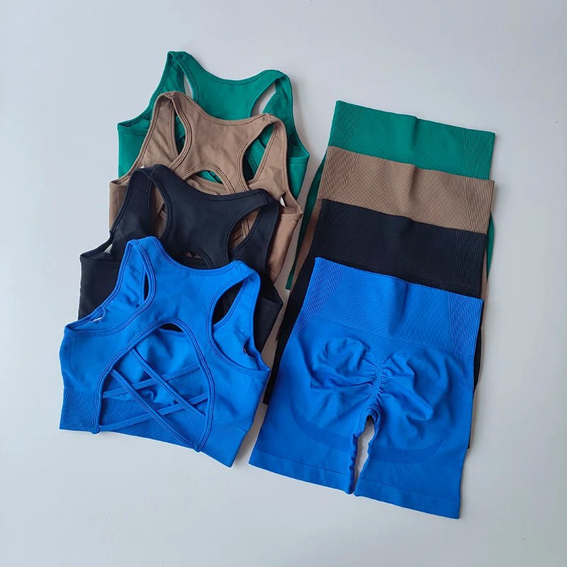 Collection of seamless women's sports bras and shorts in various colors, perfect for yoga and activewear.