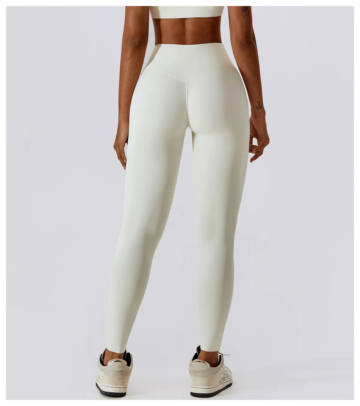 High-waist scrunch butt yoga leggings for women, showcasing a curve-enhancing fit from the back.
