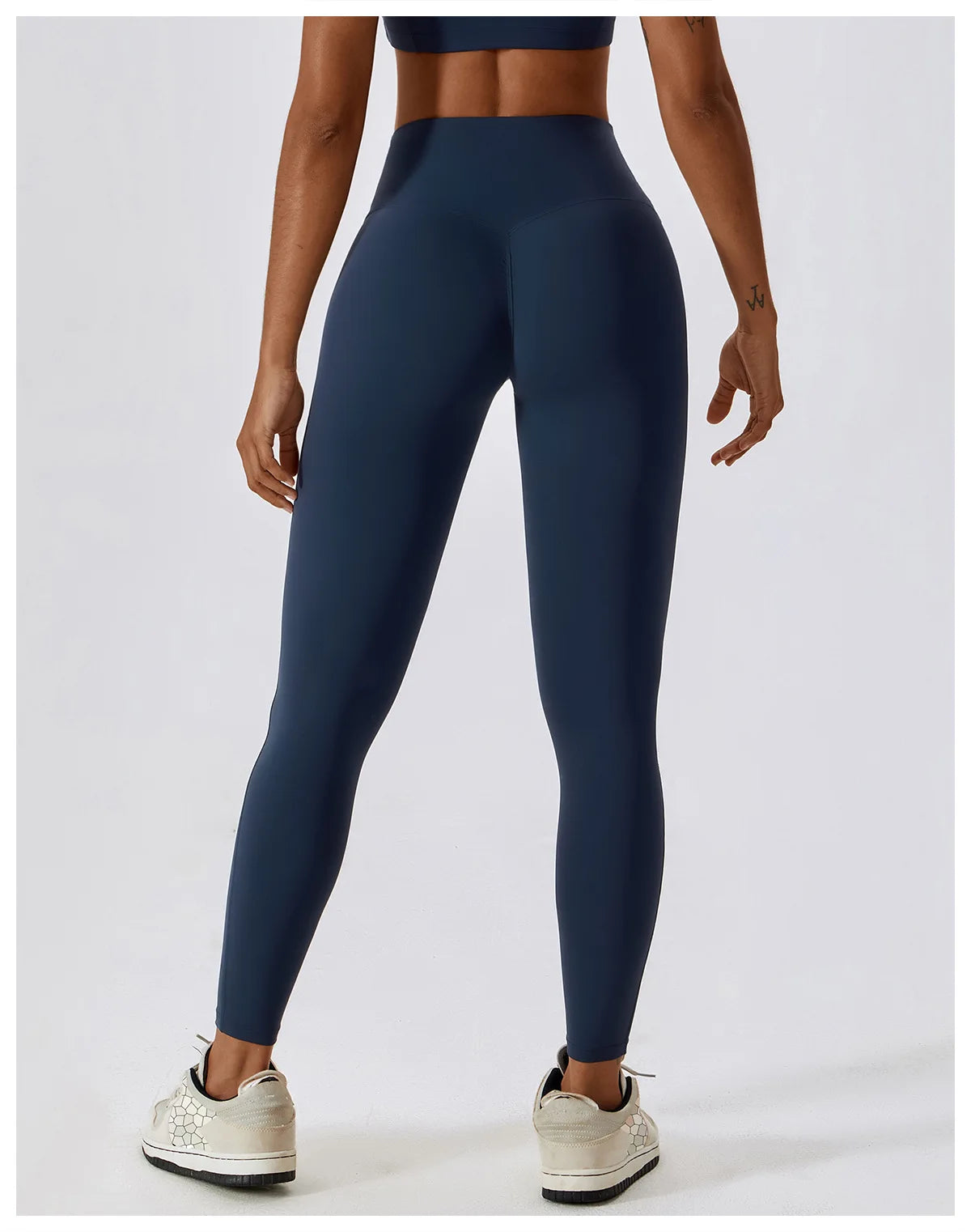 High-waist scrunch butt yoga leggings for women in navy, showcasing a flattering fit and seamless design.