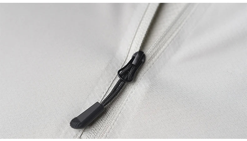 Close-up of zipper detail on Men’s Speed-Dry Long Sleeve Fitness Top, showcasing quality craftsmanship and design.