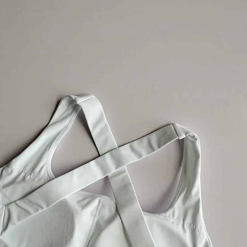 Close-up view of white seamless push-up sports bra straps, emphasizing comfort and style for active women.