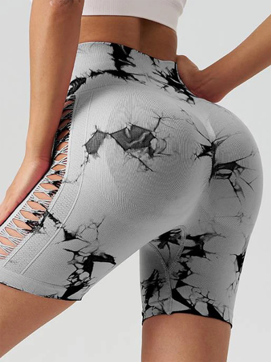 Women's high waist yoga shorts with stylish crack pattern and side lace-up detail, perfect for workouts and activewear.
