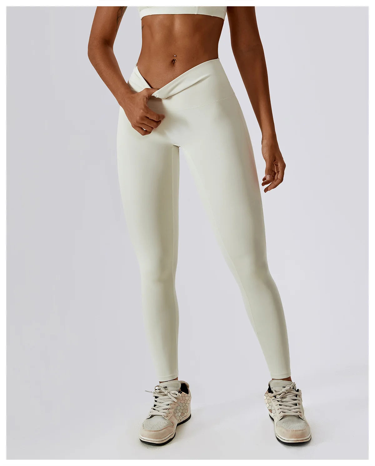 High-waist scrunch butt yoga leggings for women in light color, perfect for fitness and activewear.