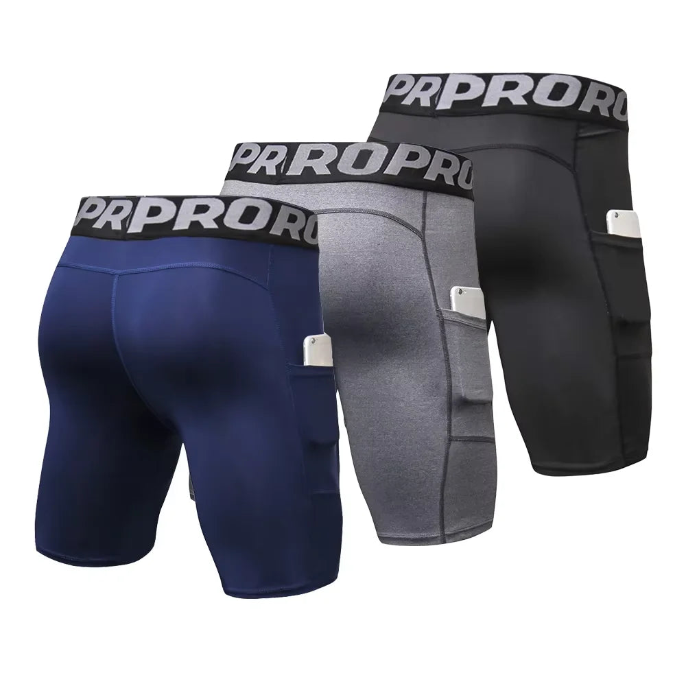 3-Pack Men's Compression Gym Shorts in navy, gray, and black with pockets for optimal support and comfort.