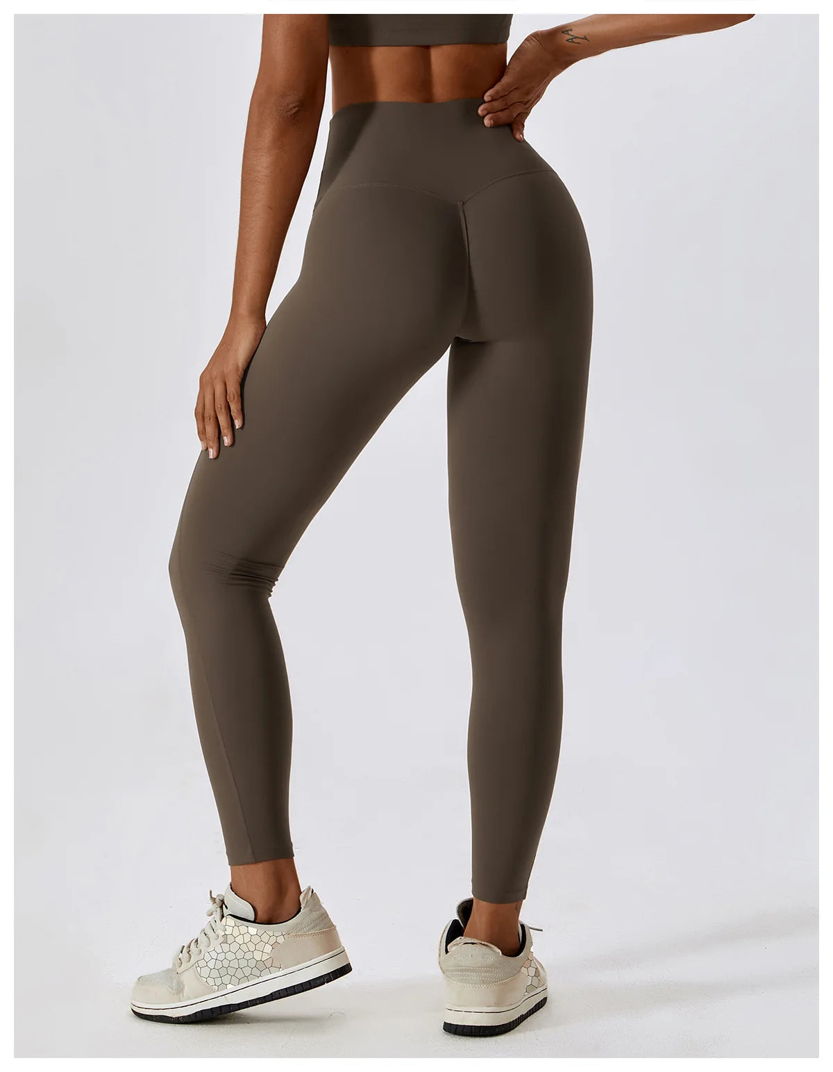High-waist scrunch butt yoga leggings for women in olive green, showcasing a flattering fit from the back.