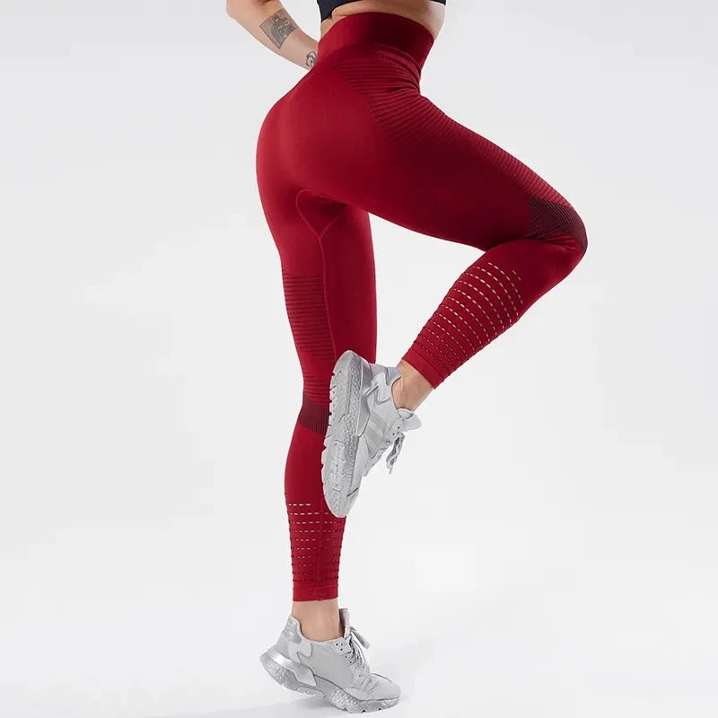 High waist seamless women fitness leggings in red, designed for comfort and style during workouts.