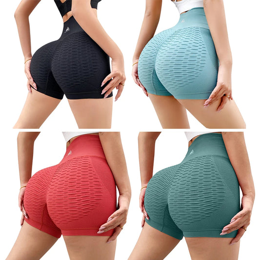 Women's high-waist workout shorts in black, teal, green, and red, designed for comfort and performance.