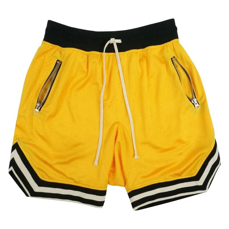 Men's yellow mesh basketball shorts with elastic waist and side zippers for quick-dry comfort and breathability.