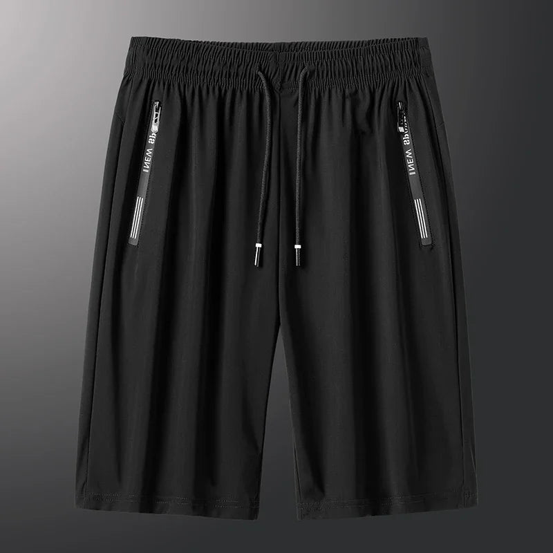 Men's plus size ice silk stretch gym shorts in black, featuring elastic waistband and zippered pockets, ideal for comfort and style.