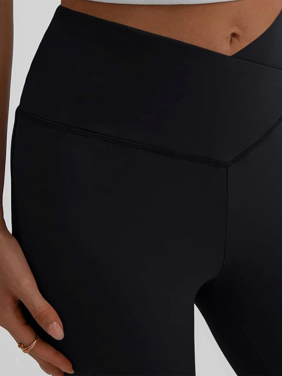 Close-up of Women's High Waist Yoga Leggings featuring a sleek black design and comfortable tummy control fit.