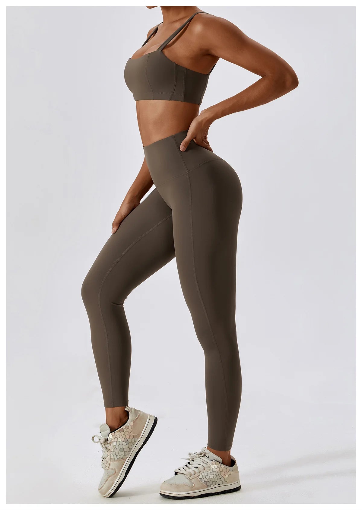 High-waist scrunch butt yoga leggings for women in olive green, paired with a sports bra for a stylish workout look.