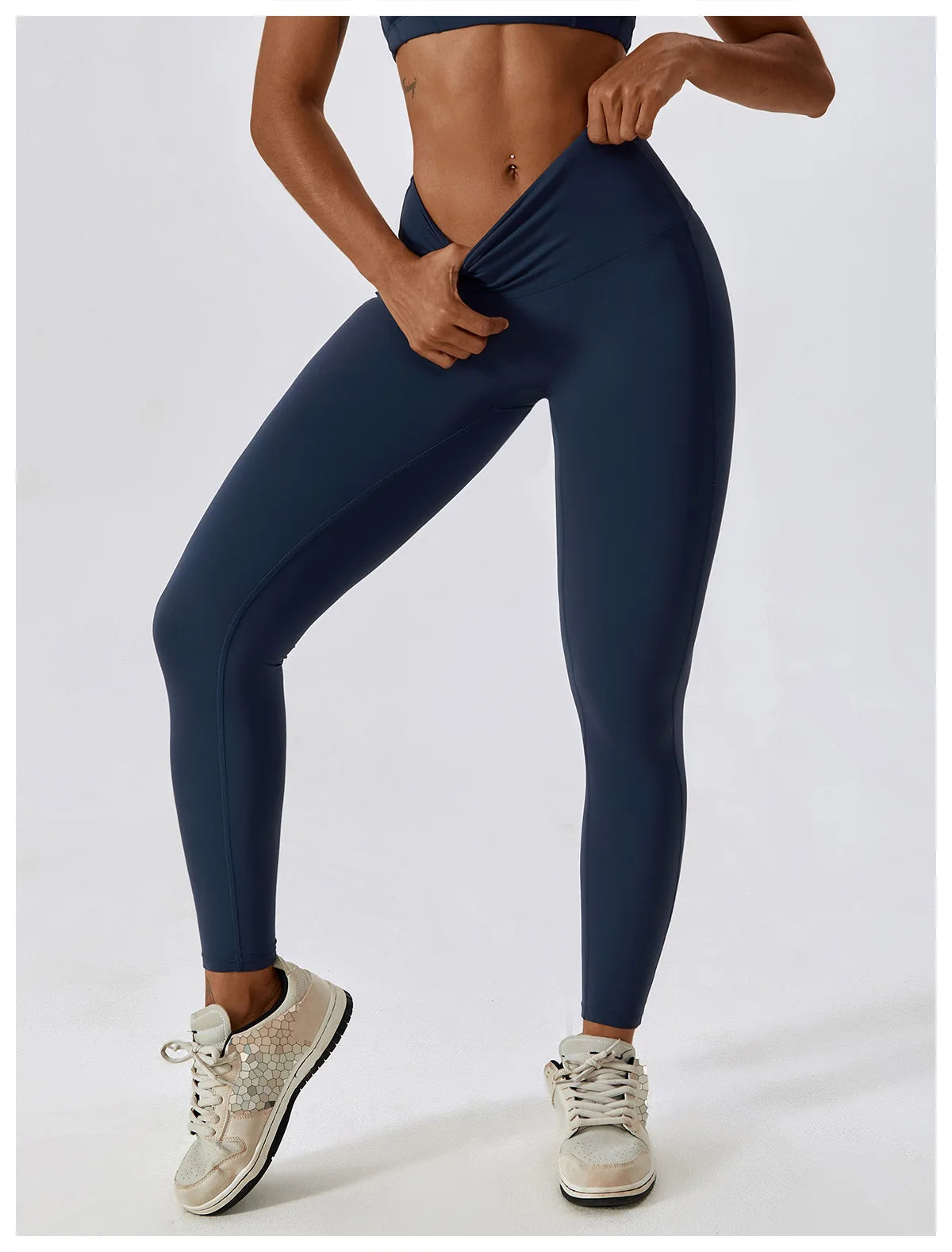 Woman wearing high-waist scrunch butt yoga leggings, highlighting their fit and flexibility in stylish activewear.