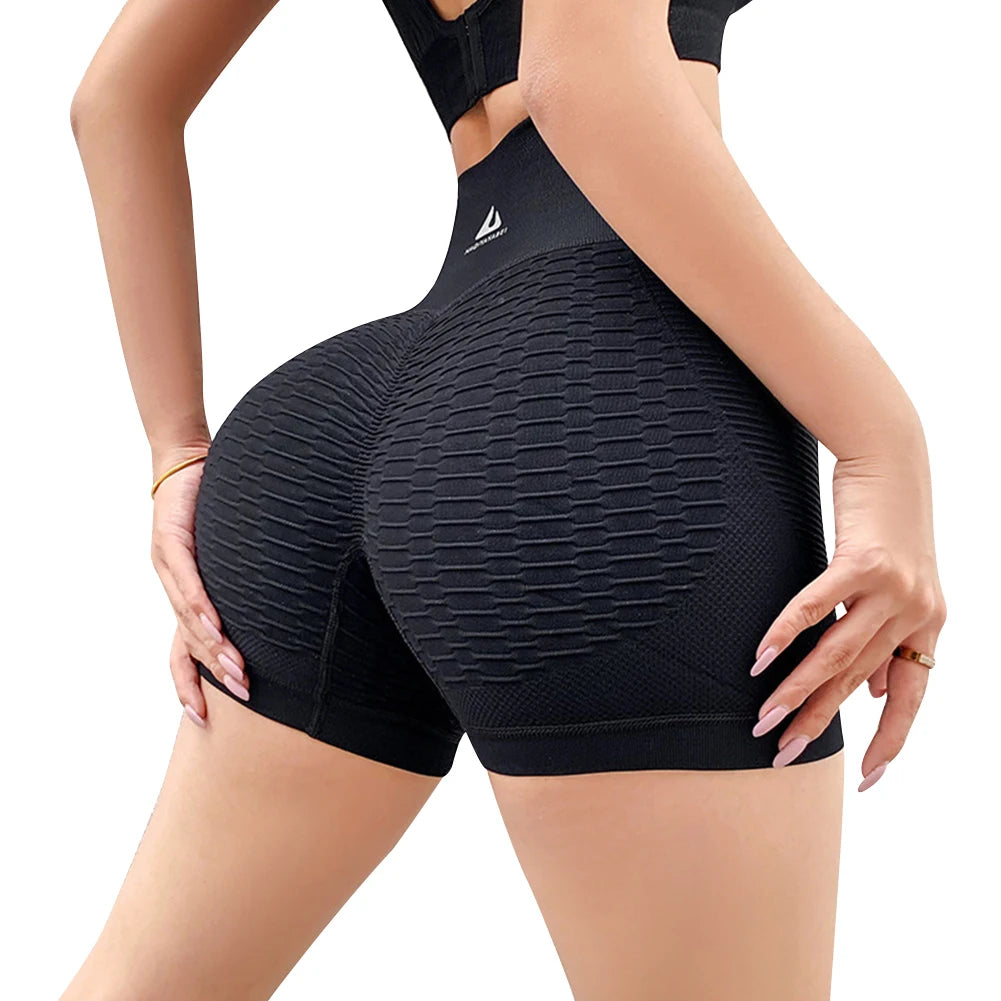 Women's high-waist workout shorts featuring a breathable design for comfort and support during fitness activities.