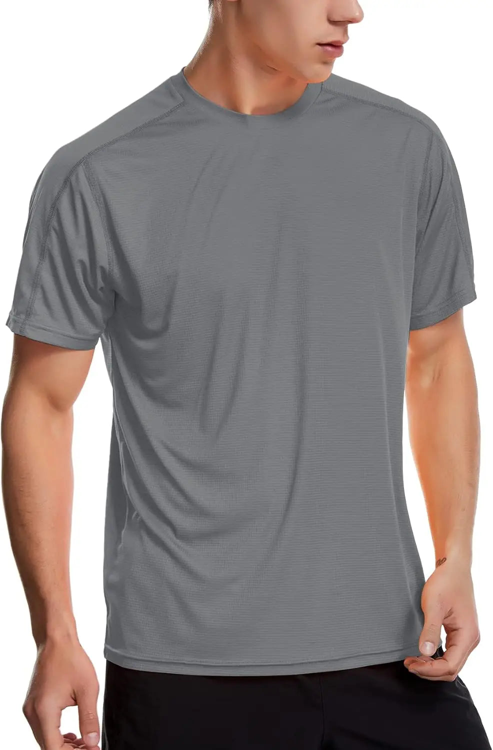 Men's moisture-wicking workout shirt in gray, designed for comfort and performance during training.