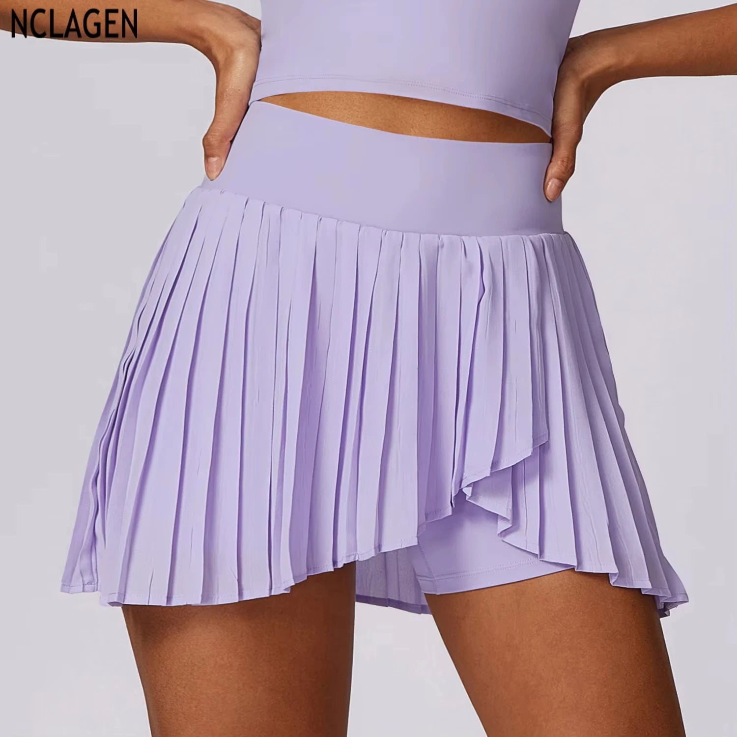 Safe tennis skirt with pocket shorts in lavender, featuring a pleated design for a stylish and functional athletic look.
