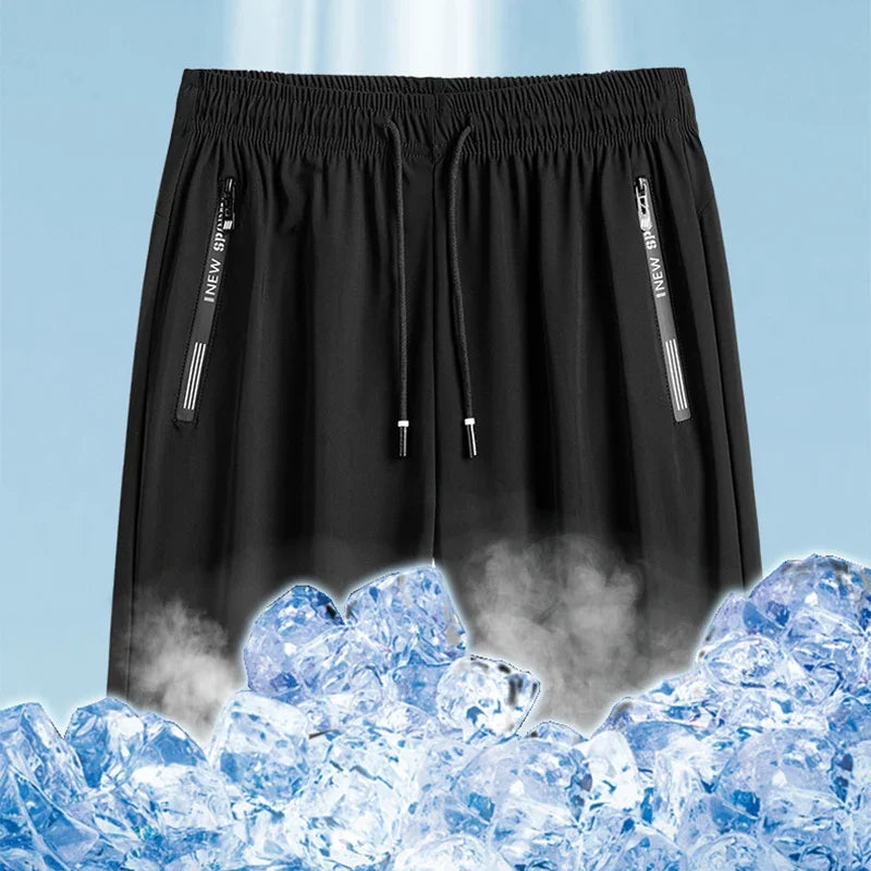 Men's plus size ice silk stretch gym shorts in black over ice, showcasing breathability and comfort for workouts.