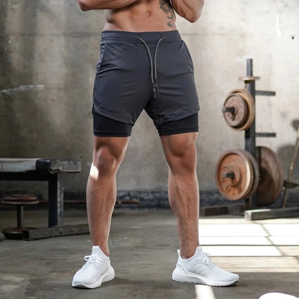 Men's double-decker running shorts with built-in liner for comfort and support, ideal for workouts.