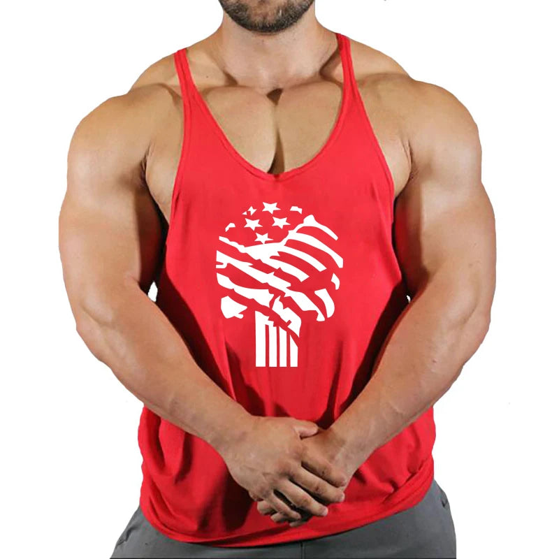 Muscular man in a red bodybuilding tank top featuring a distressed American flag design.