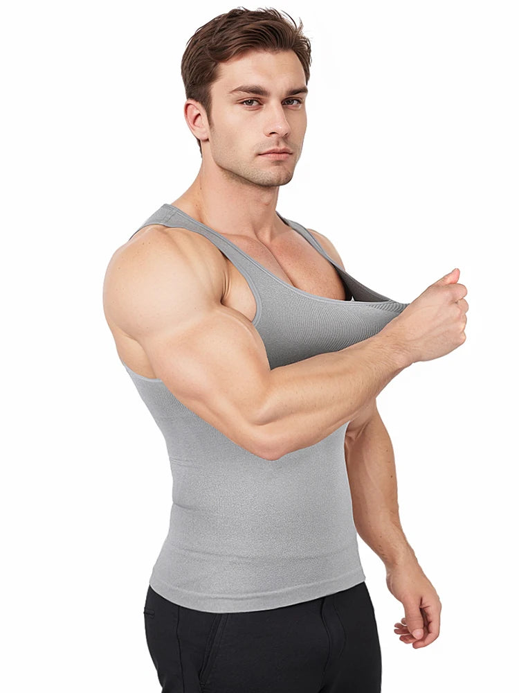 Men in gray muscle compression tank top, showcasing its form-fitting design and muscle definition.