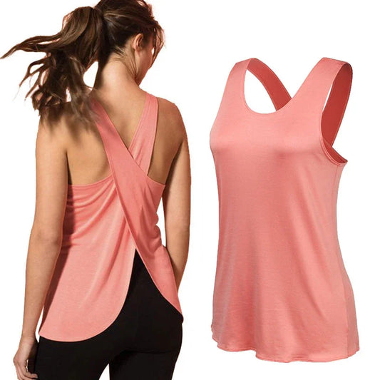 Women's performance gym tee in coral, featuring a stylish open-back design and moisture-wicking fabric for workouts.