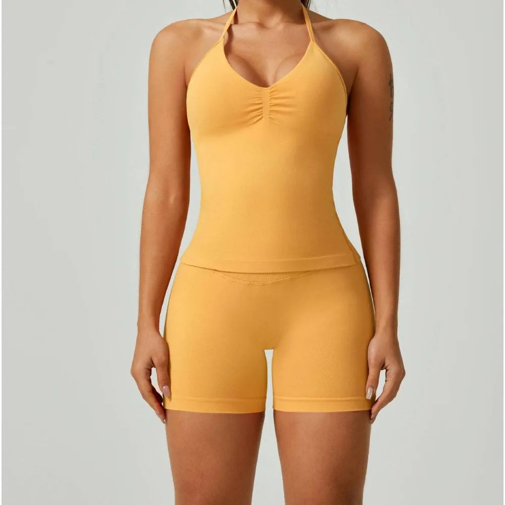 Yellow V-neck strappy top and shorts for women, perfect for yoga, running, and outdoor workouts.