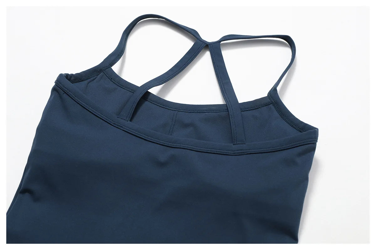 Close-up of a navy blue Cross Back Push-Up Sports Bra showing wide straps and a stylish design.