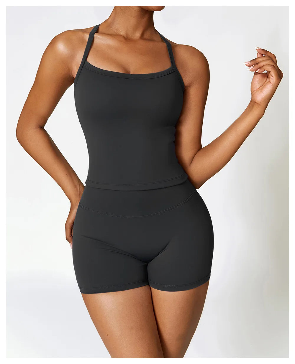 Woman wearing a black cross-back sport outfit showcasing comfort and style for active training.
