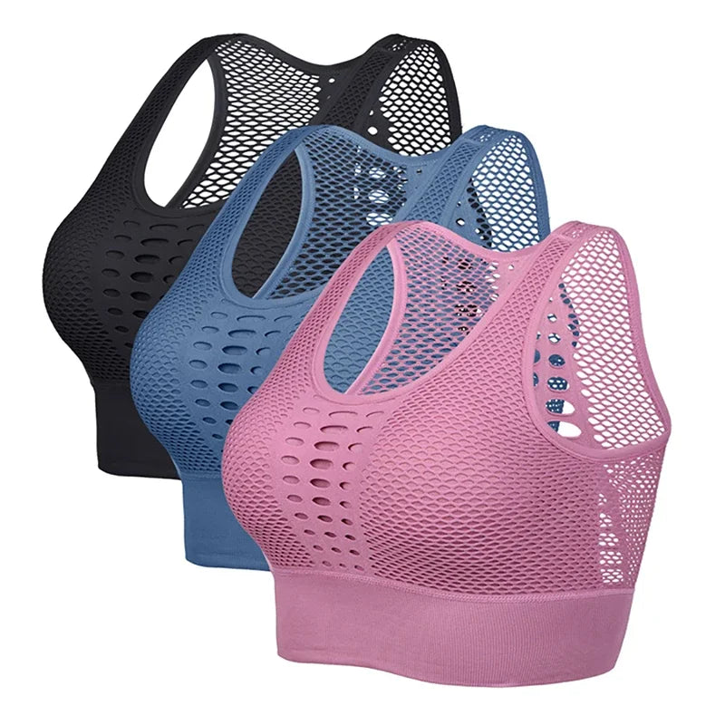 Three women's breathable mesh sports bras in black, blue, and pink, designed for comfort and style during workouts.