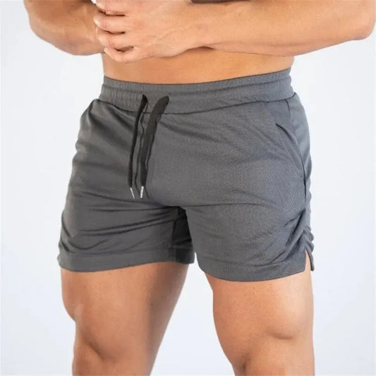 Men's summer fitness shorts in gray, designed for workouts and outdoor activities with breathable, moisture-wicking fabric.