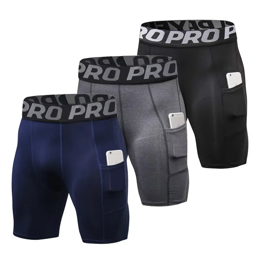 3-Pack Men's Compression Gym Shorts with pockets in navy, gray, and black for optimal performance and comfort.