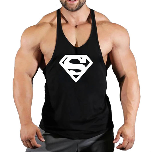 Muscular man wearing a black cotton tank top with a white Superman logo, perfect for summer workouts.